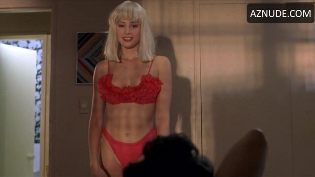 Mira Sorvino gives a blowjob to a young man