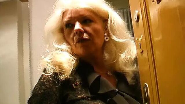 Old and busty German granny in stockings enjoys making a cock cum