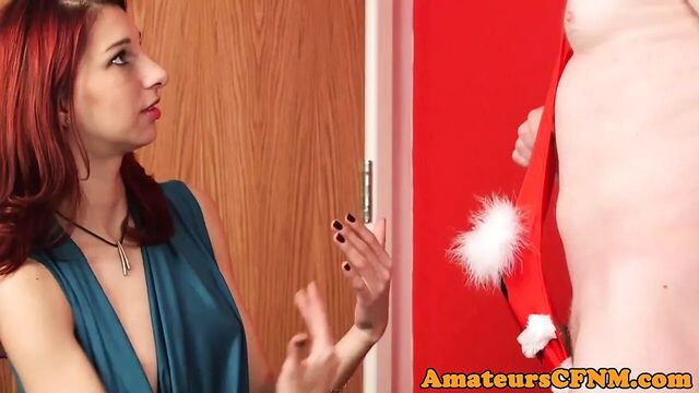 CFNM redhead wanks man in christmas mankini