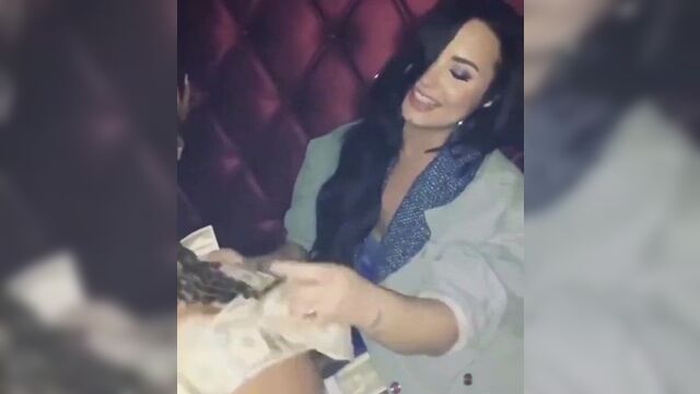 Demi Lovato at stripclub